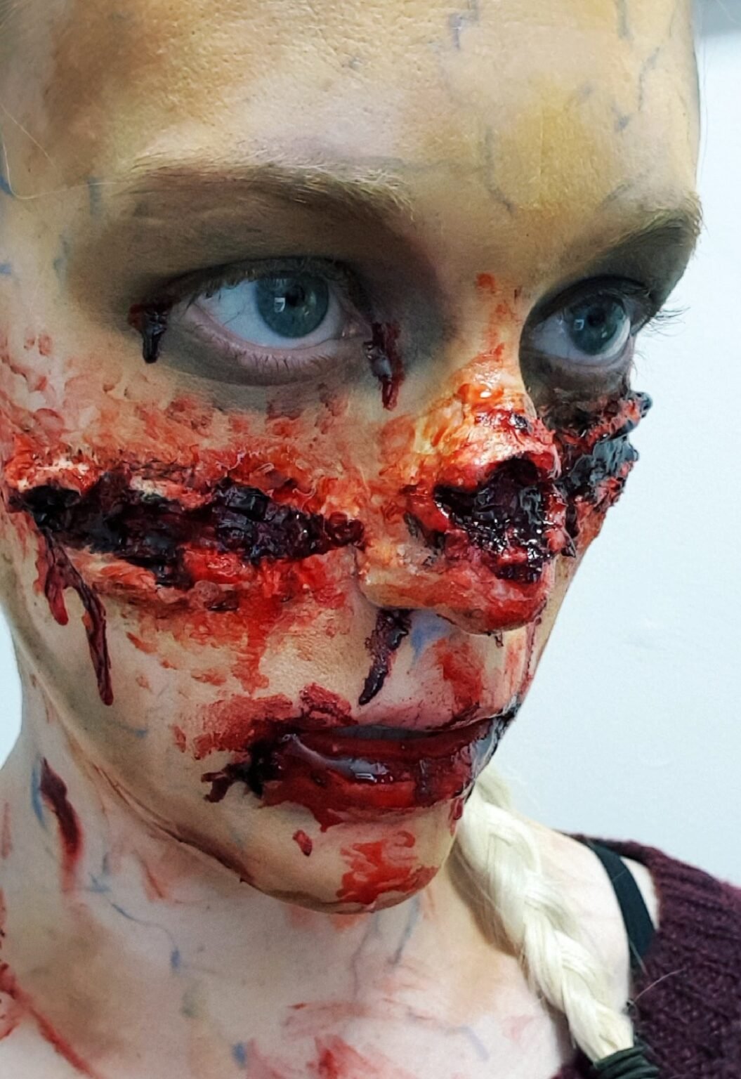 zombie scare actor with blood on face