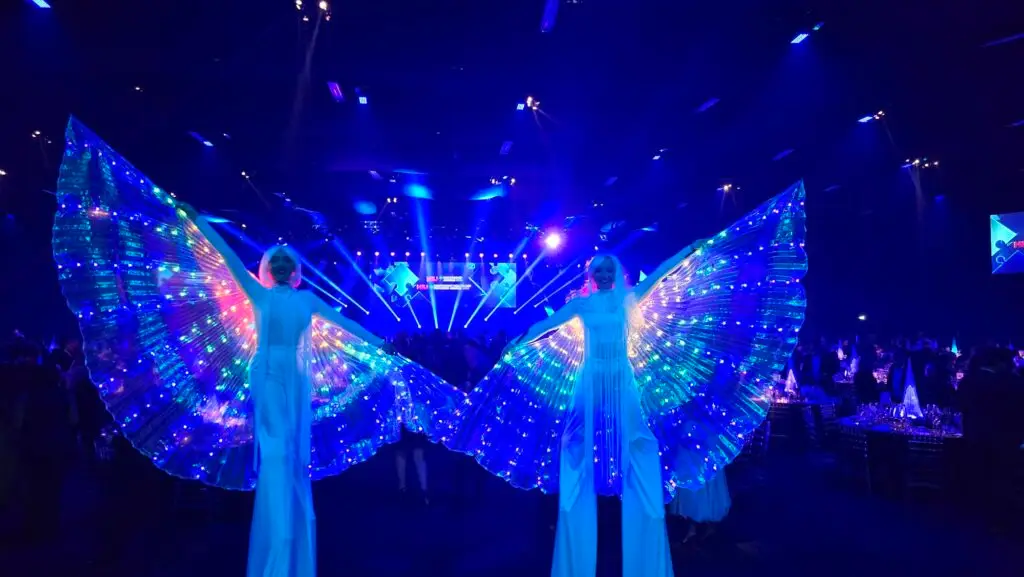 beautiful blue LED stilt walkers