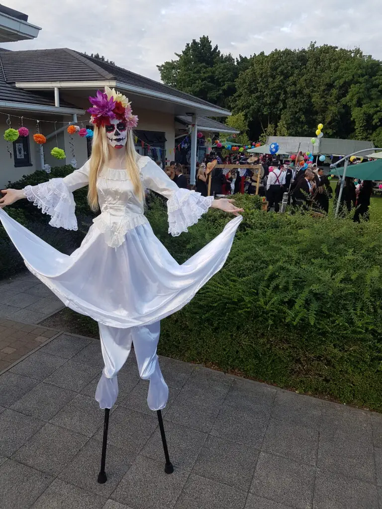 day of the dead stilt walker
